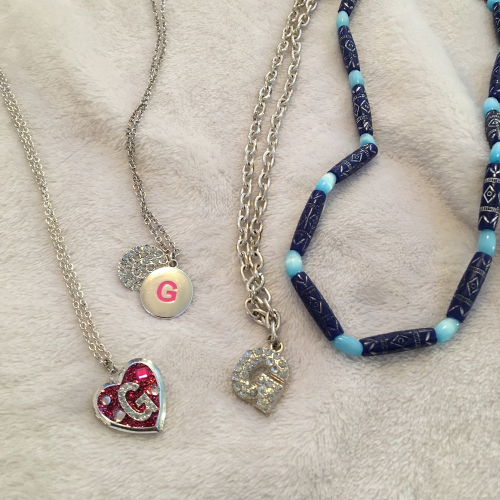 “G” necklaces